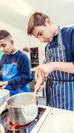 Boys at Gosforth Academy cooking